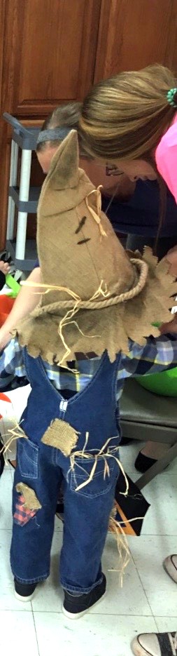 Easy DIY scarecrow costume. Only a few materials needed, a lot of what you probably already have around the house.